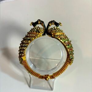 Peacock golden and rhinestone hinged openable bangle